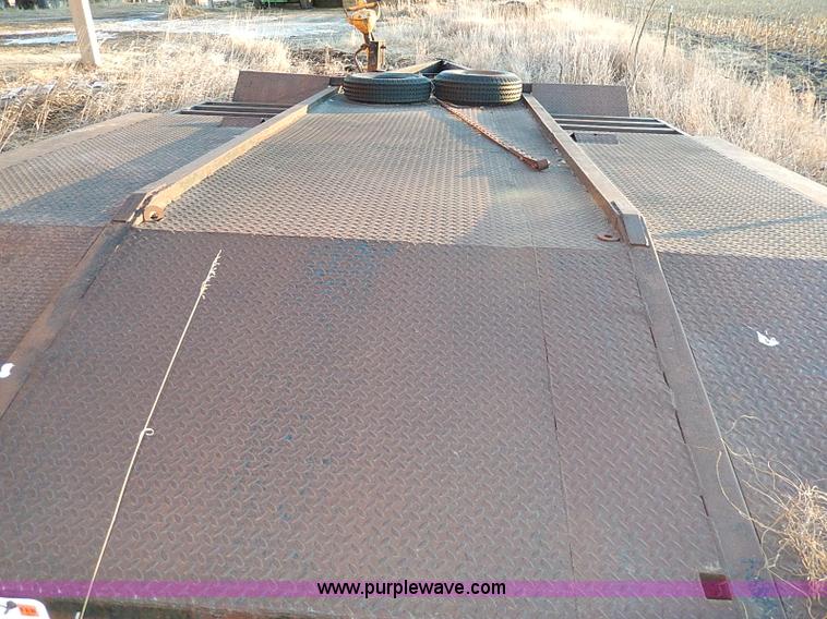 image for item H1290 1974 Gold Nugget 10-6 swather trailer