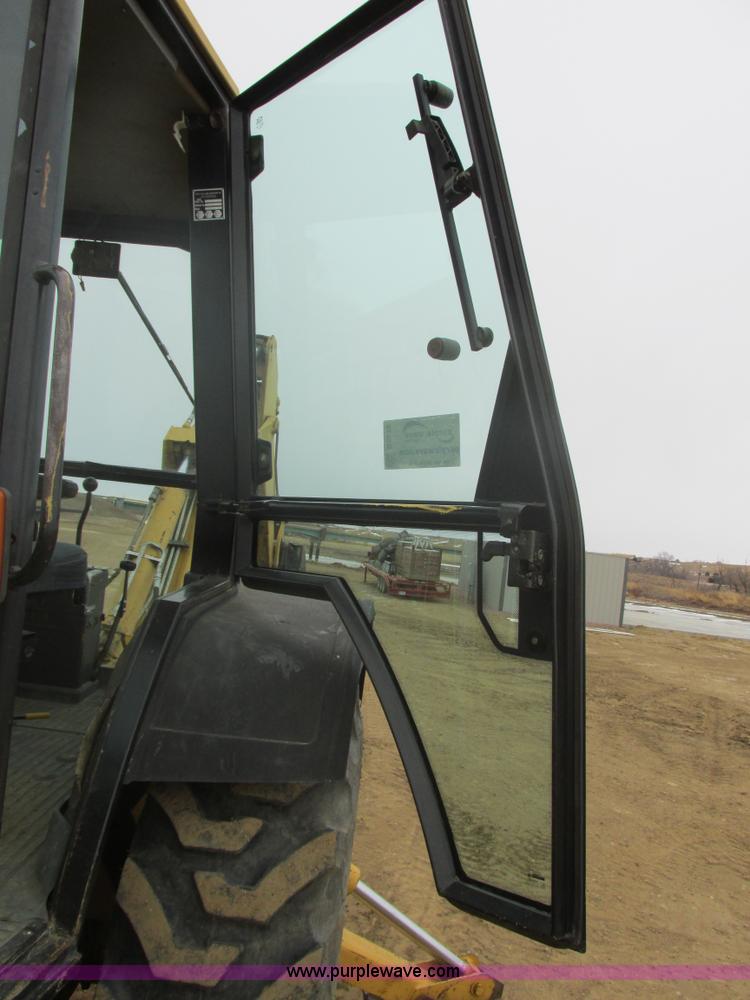 image for item E5272 Ford 555D backhoe