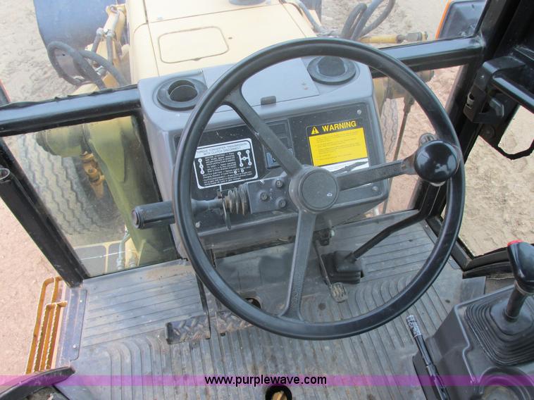 image for item E5272 Ford 555D backhoe