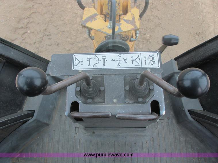 image for item E5272 Ford 555D backhoe