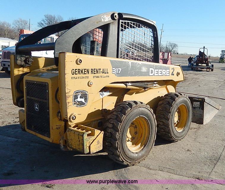 image for item H1267 2006 John Deere 317 skid steer