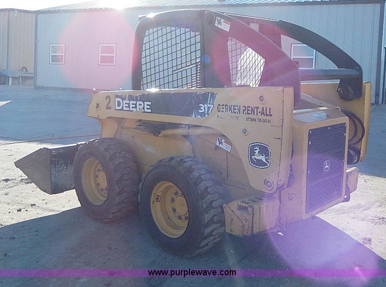 image for item H1267 2006 John Deere 317 skid steer