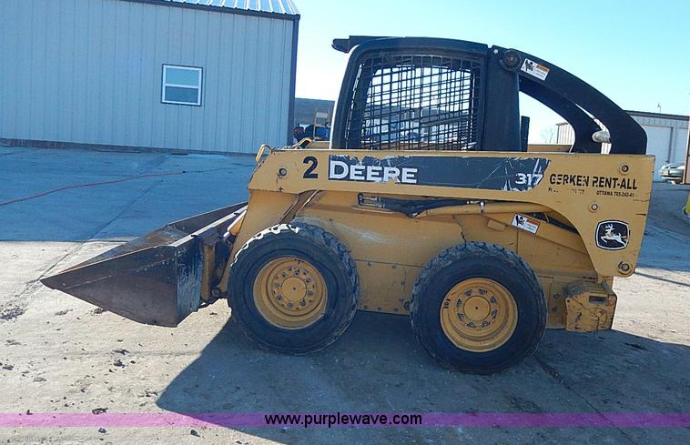 image for item H1267 2006 John Deere 317 skid steer