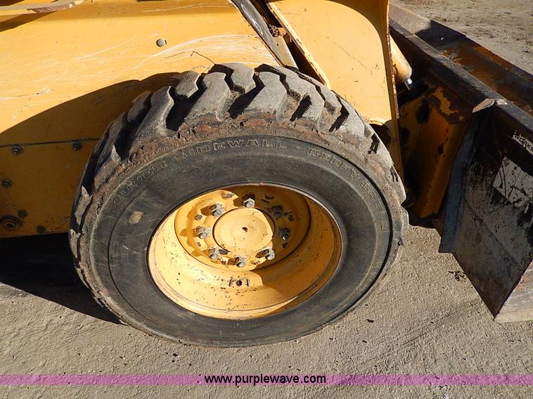 image for item H1267 2006 John Deere 317 skid steer