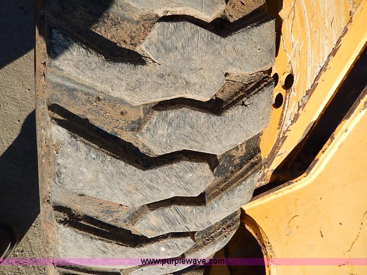 image for item H1267 2006 John Deere 317 skid steer