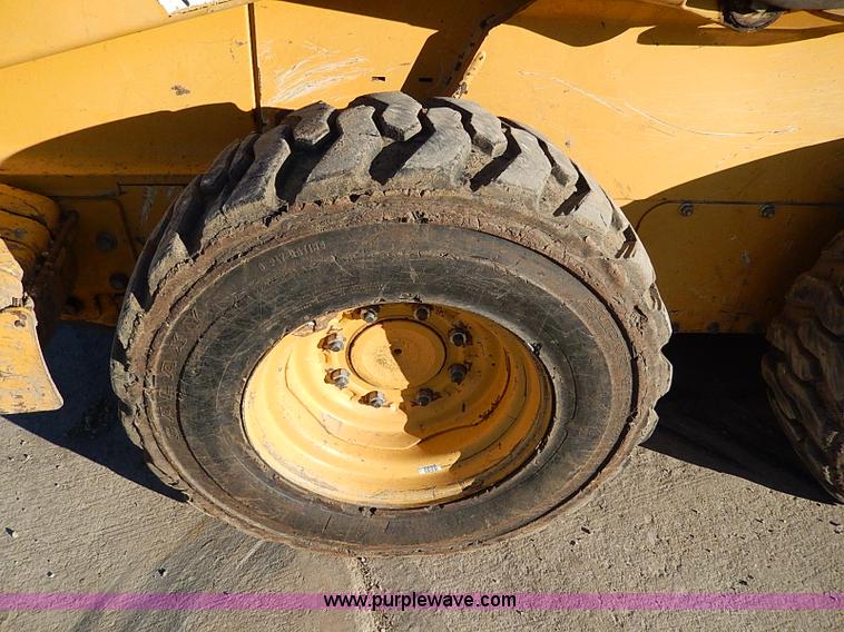 image for item H1267 2006 John Deere 317 skid steer