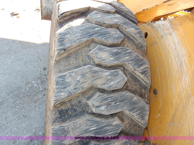 image for item H1267 2006 John Deere 317 skid steer