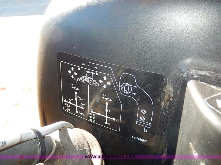 image for item H1271 2006 John Deere 110 backhoe