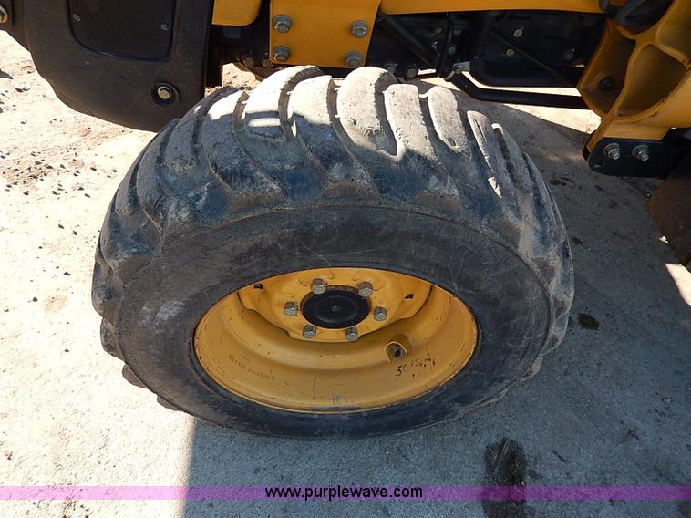 image for item H1271 2006 John Deere 110 backhoe