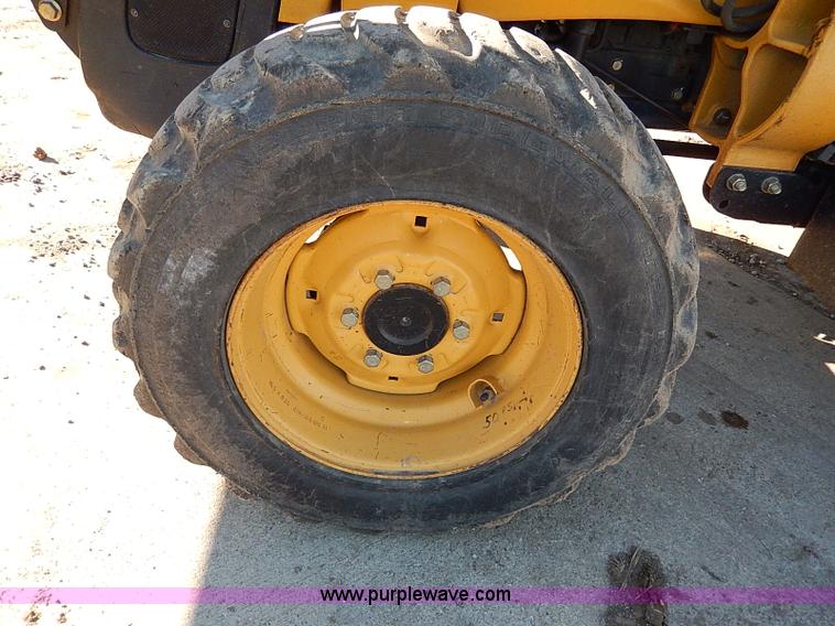 image for item H1271 2006 John Deere 110 backhoe