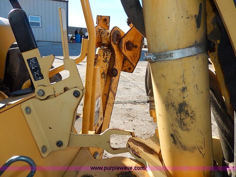 image for item H1271 2006 John Deere 110 backhoe