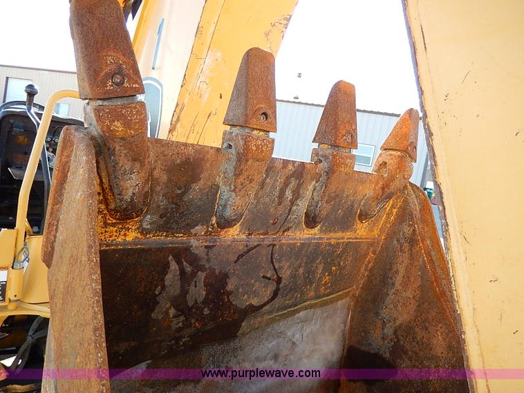 image for item H1271 2006 John Deere 110 backhoe