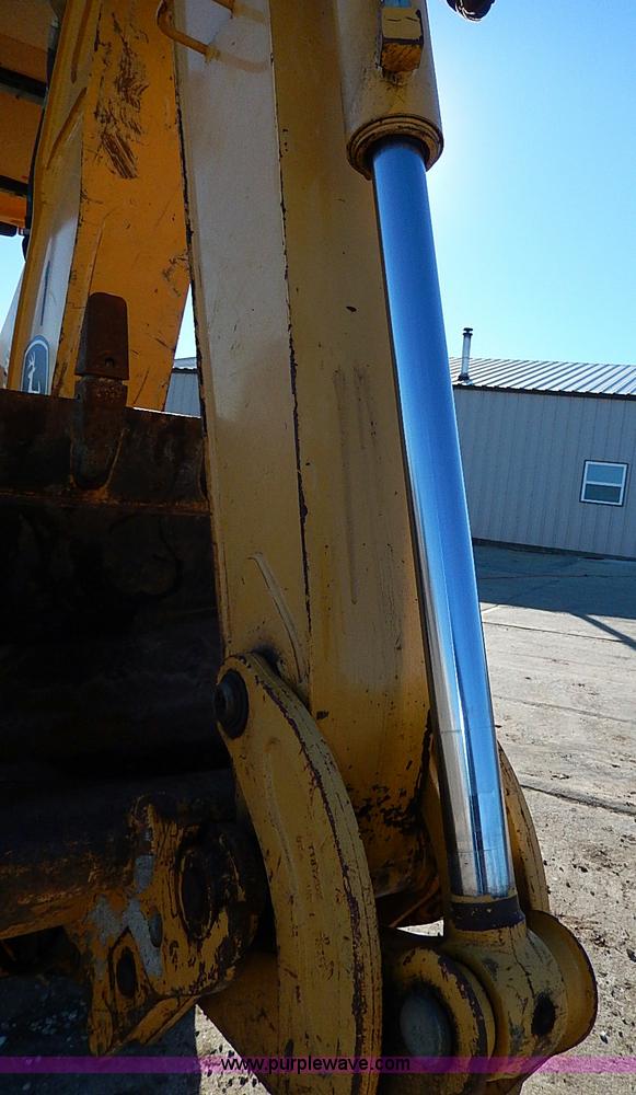 image for item H1271 2006 John Deere 110 backhoe