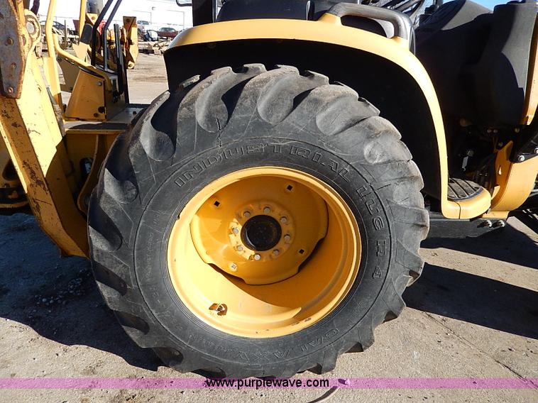 image for item H1271 2006 John Deere 110 backhoe