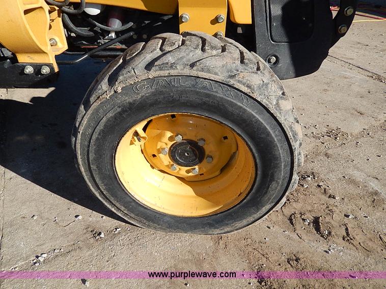 image for item H1271 2006 John Deere 110 backhoe