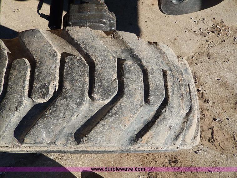 image for item H1271 2006 John Deere 110 backhoe