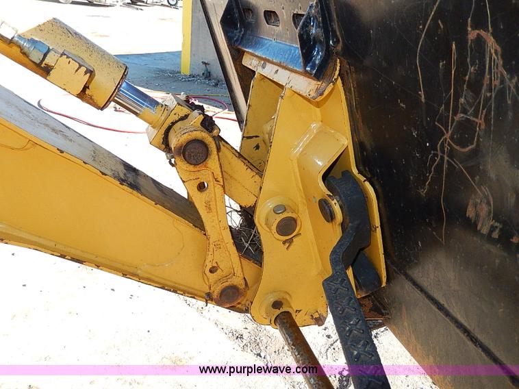 image for item H1271 2006 John Deere 110 backhoe