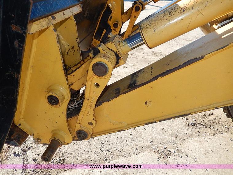 image for item H1271 2006 John Deere 110 backhoe