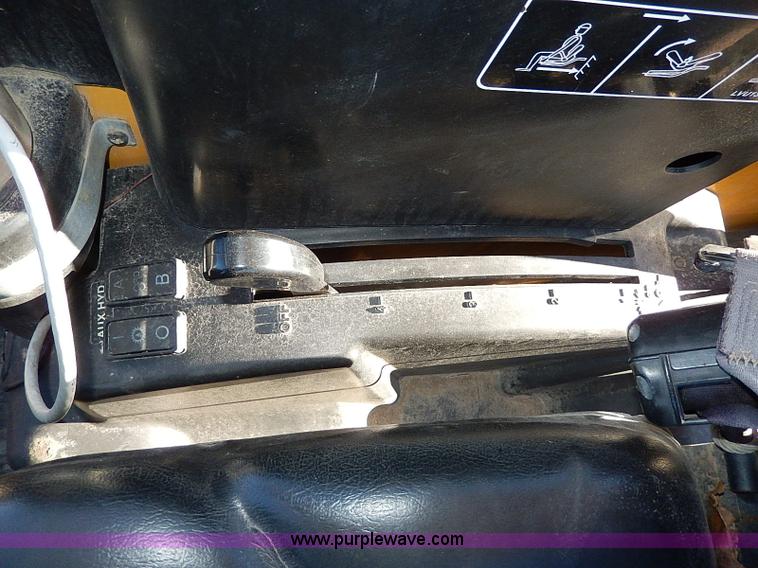 image for item H1272 2006 John Deere 110 backhoe