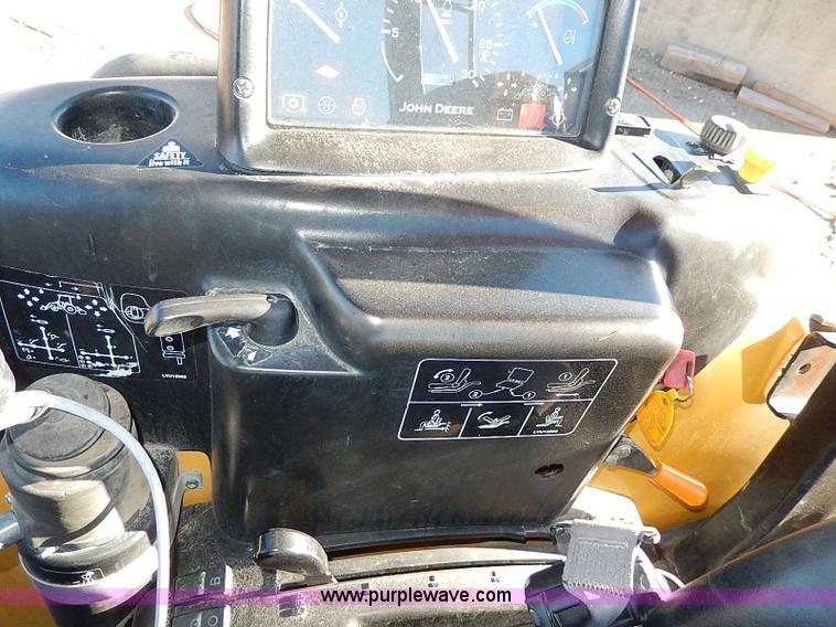 image for item H1272 2006 John Deere 110 backhoe