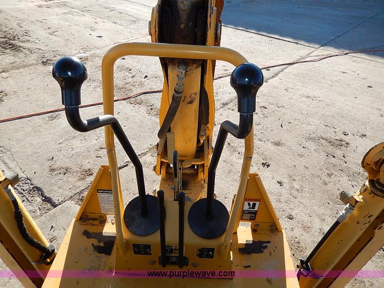 image for item H1272 2006 John Deere 110 backhoe