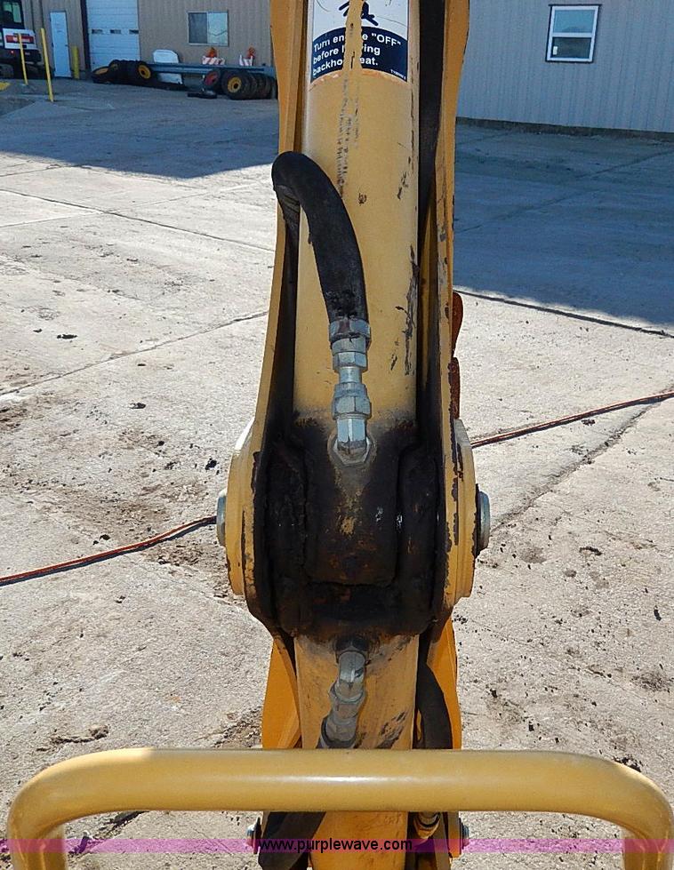 image for item H1272 2006 John Deere 110 backhoe