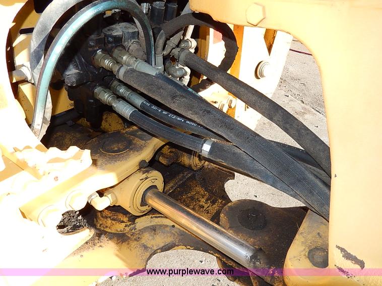 image for item H1272 2006 John Deere 110 backhoe