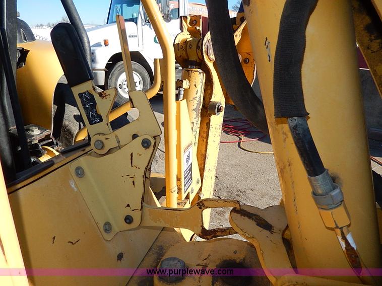 image for item H1272 2006 John Deere 110 backhoe