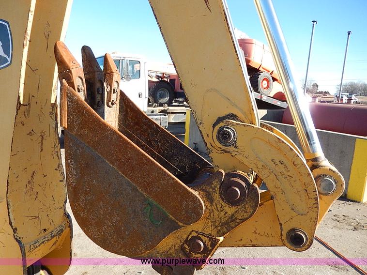 image for item H1272 2006 John Deere 110 backhoe