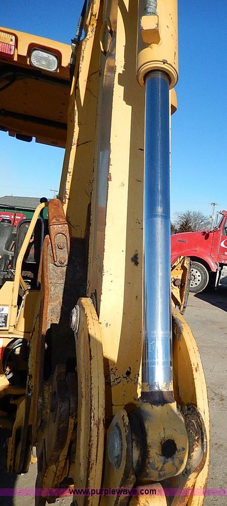 image for item H1272 2006 John Deere 110 backhoe