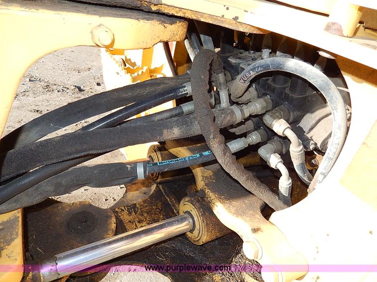 image for item H1272 2006 John Deere 110 backhoe