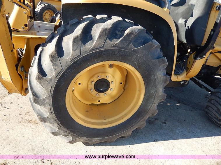 image for item H1272 2006 John Deere 110 backhoe