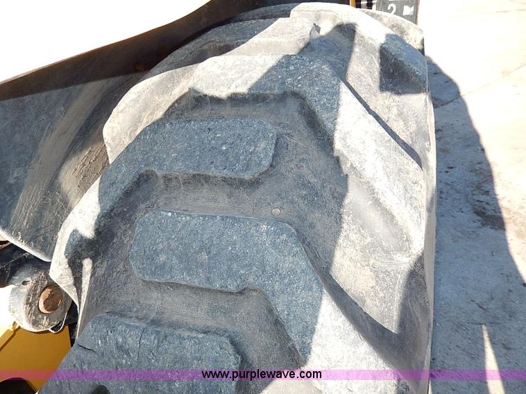 image for item H1272 2006 John Deere 110 backhoe