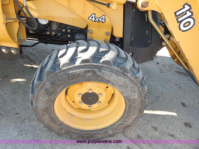 image for item H1272 2006 John Deere 110 backhoe
