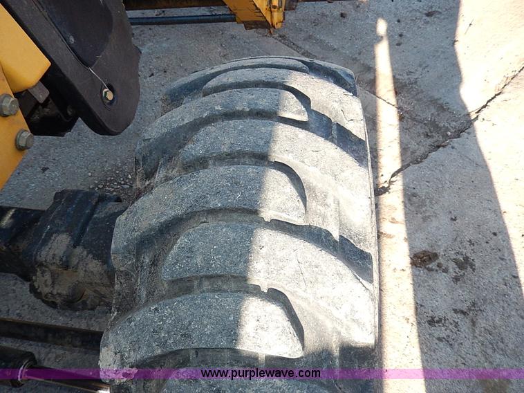 image for item H1272 2006 John Deere 110 backhoe