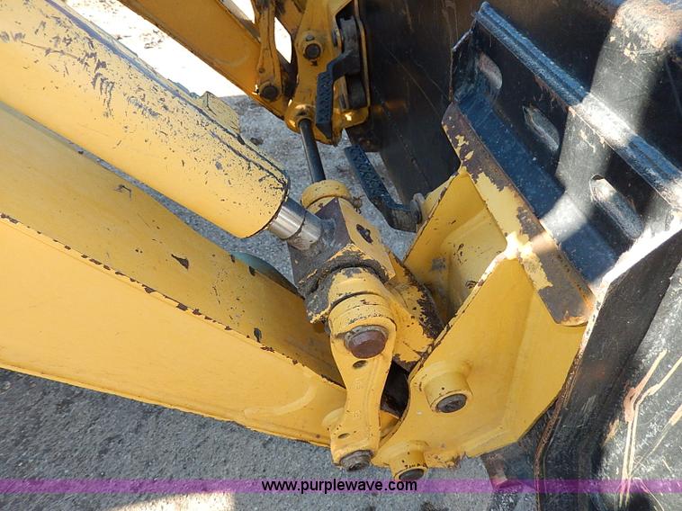 image for item H1272 2006 John Deere 110 backhoe