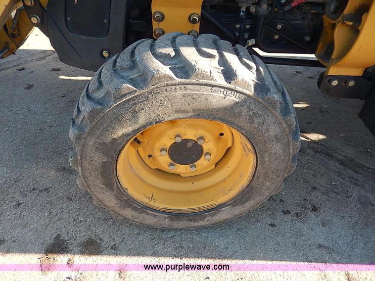 image for item H1272 2006 John Deere 110 backhoe