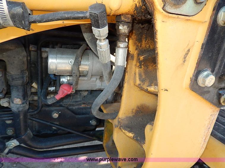 image for item H1272 2006 John Deere 110 backhoe