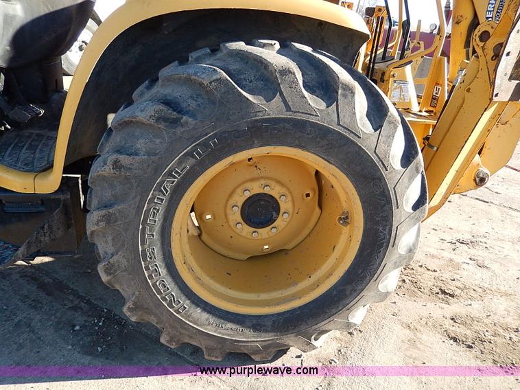 image for item H1272 2006 John Deere 110 backhoe