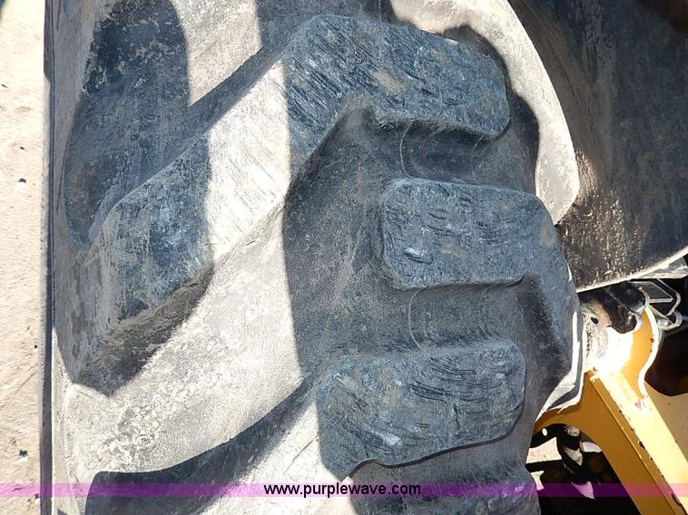 image for item H1272 2006 John Deere 110 backhoe