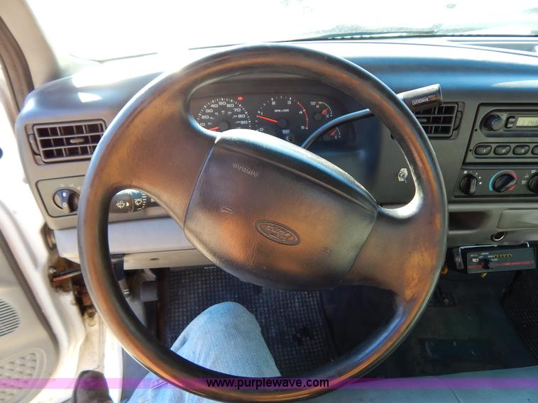 image for item H3807 2002 Ford F450 Super Duty flatbed truck