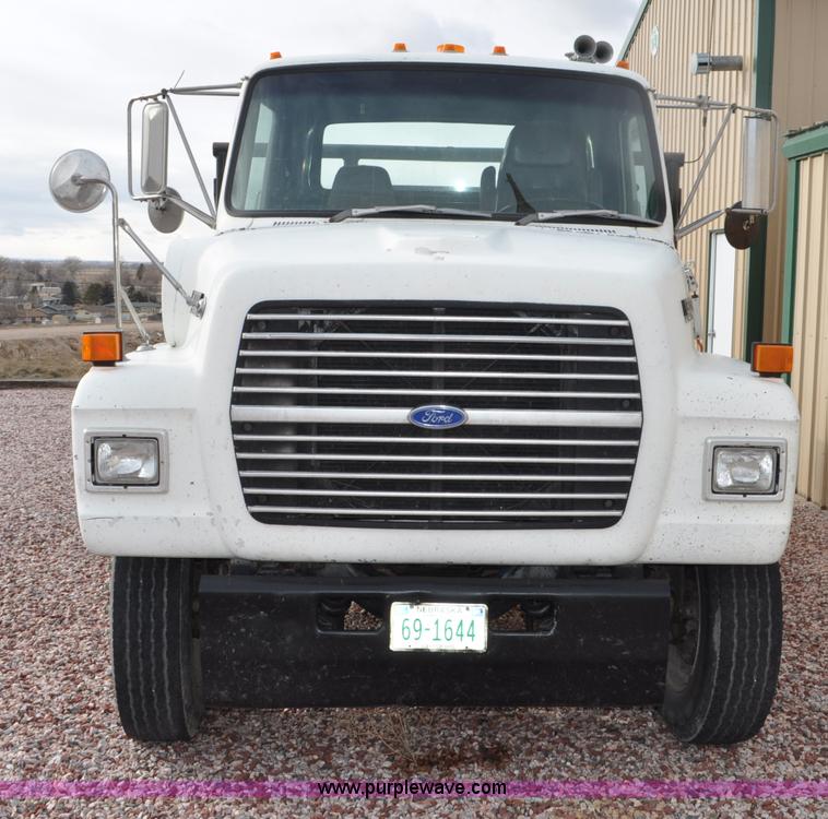 image for item G6371 1987 Ford LN8000 flatbed truck