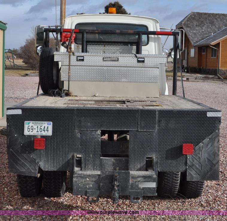 image for item G6371 1987 Ford LN8000 flatbed truck