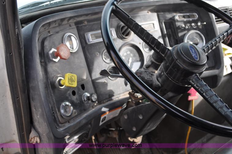 image for item G6371 1987 Ford LN8000 flatbed truck