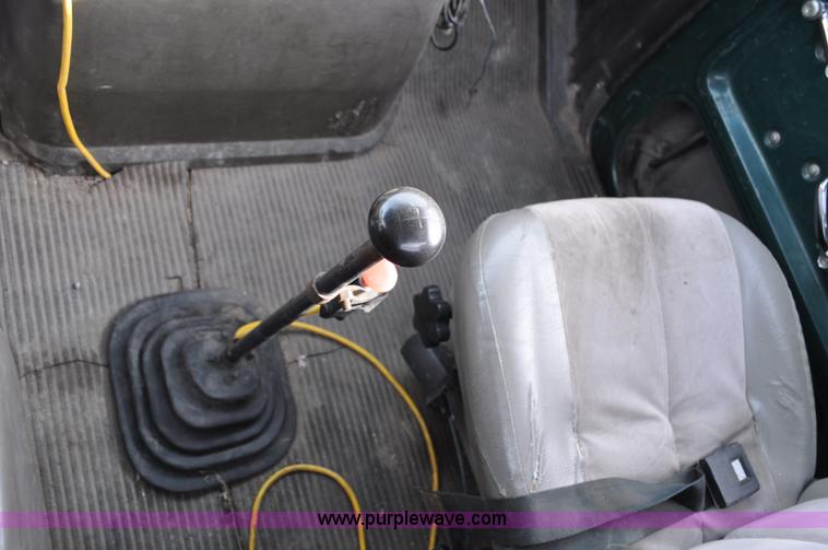 image for item G6371 1987 Ford LN8000 flatbed truck