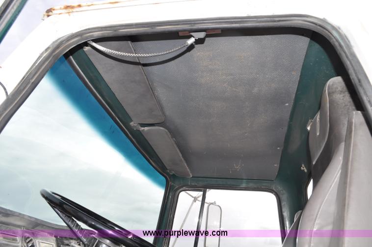 image for item G6371 1987 Ford LN8000 flatbed truck