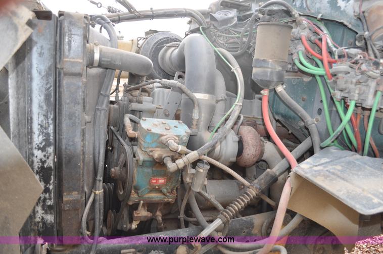 image for item G6371 1987 Ford LN8000 flatbed truck