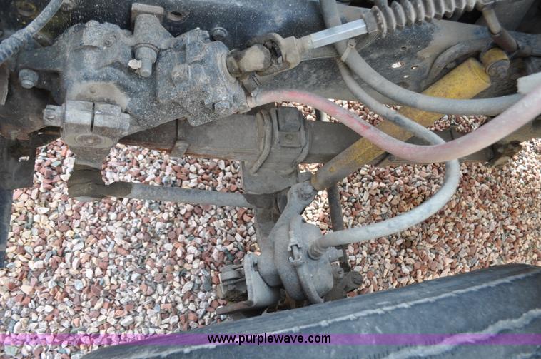 image for item G6371 1987 Ford LN8000 flatbed truck