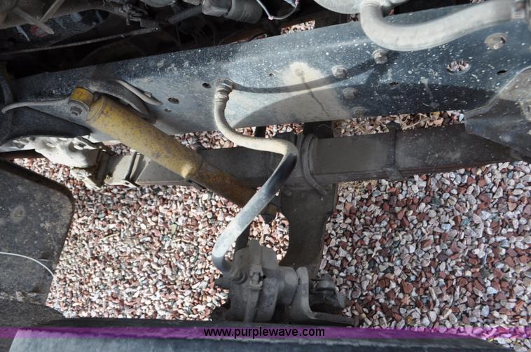 image for item G6371 1987 Ford LN8000 flatbed truck