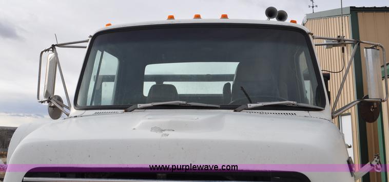 image for item G6371 1987 Ford LN8000 flatbed truck